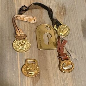 Dooney & Bourke Vintage 80’s Gold Tone Logo hang tags! Set of 5!